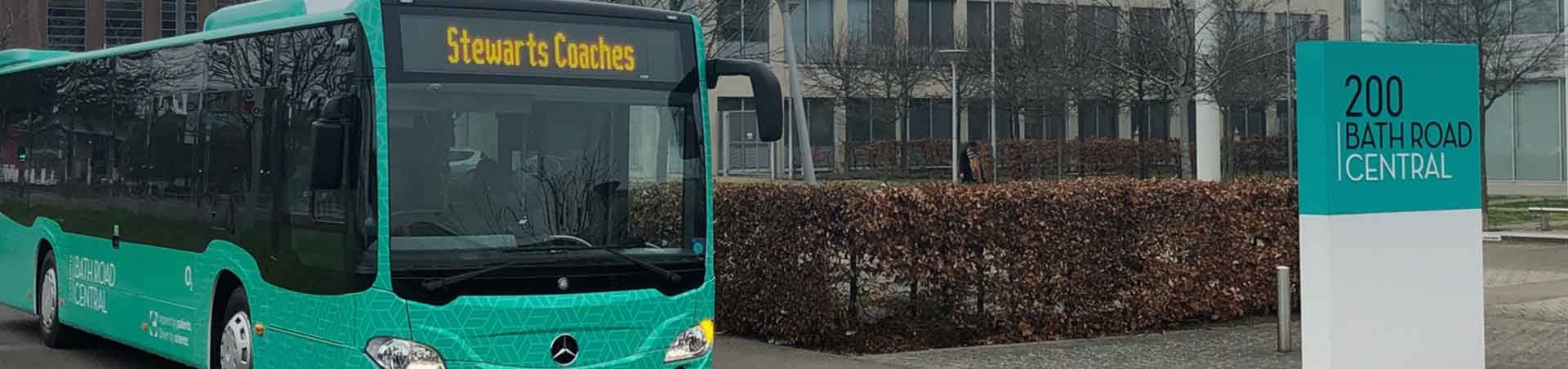 Stewarts coach branded as Bath Road shuttle service outside Bath Road Central
